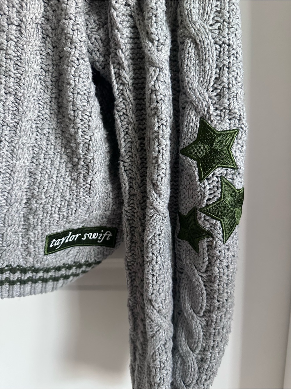 Taylor Swift Gray Cable-Knit Cardigan with Green Star Detail - Picture 2 of 3